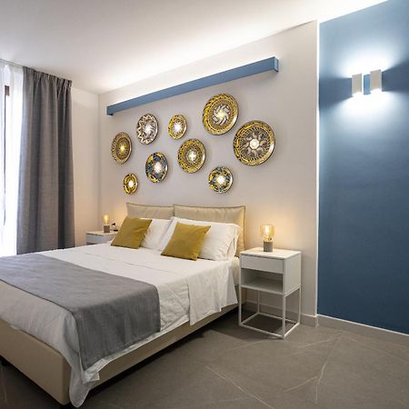 Acquaro Suite Apartments 산비토로카포 객실 사진